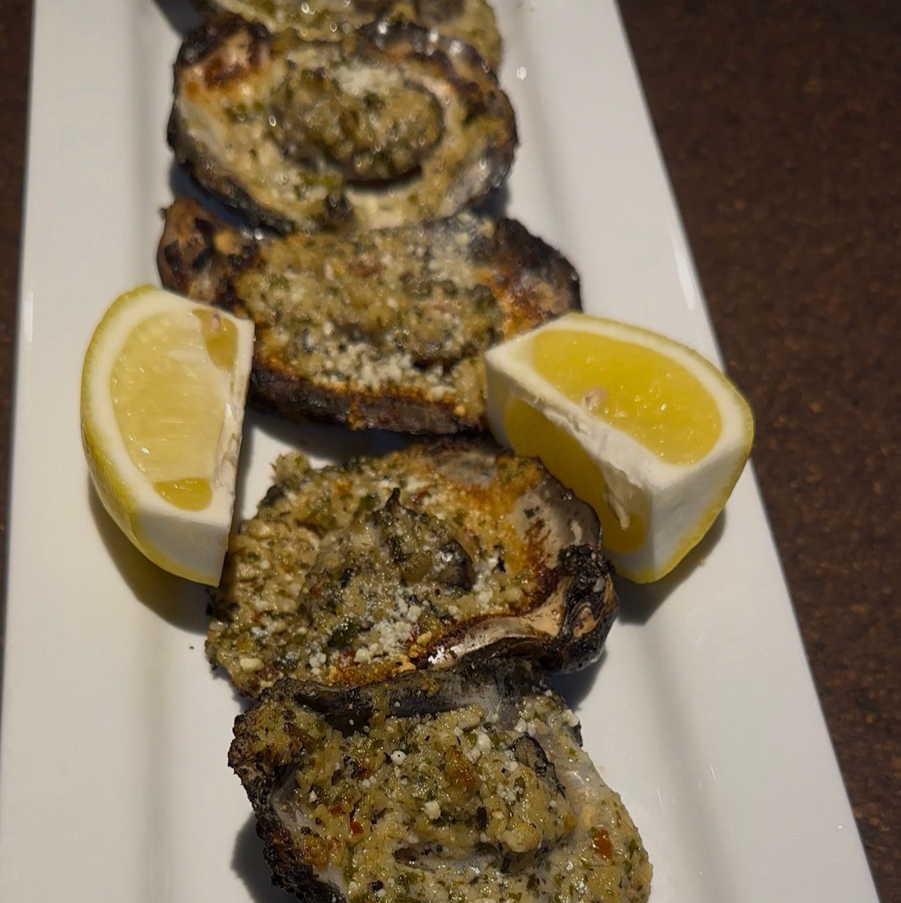 Charbroiled oysters 1/2 Dozen.